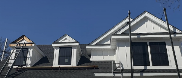Dormer trim and roofline overhang on a North Jersey exterior remodel