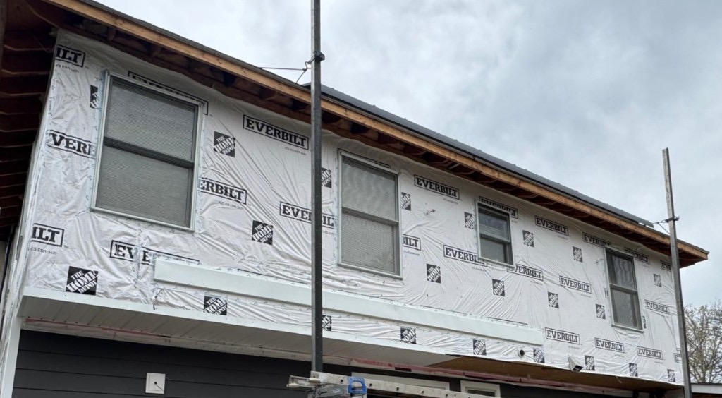 House wrap and underlayment installation before vinyl siding in New Jersey